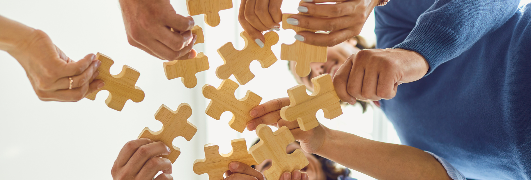 Jigsaw pieces being put together